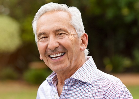 older man smiling bright