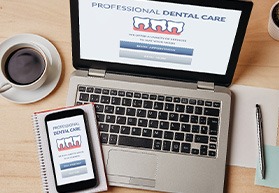 Computer with dental insurance on the screen