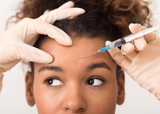 Closeup of woman getting BOTOX in Annapolis in forehead