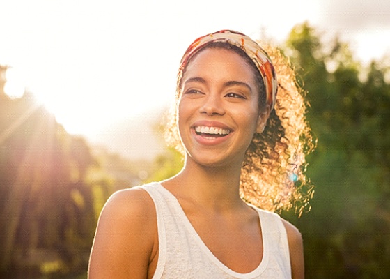 Woman smiling outside