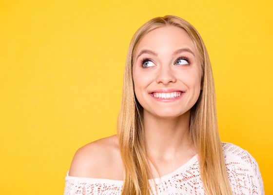 A young woman smiling