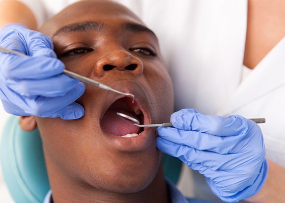 man getting tooth replacement