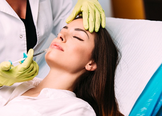 Relaxed woman getting dermal fillers in Annapolis