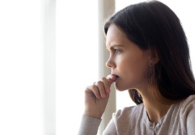 a person biting their nails