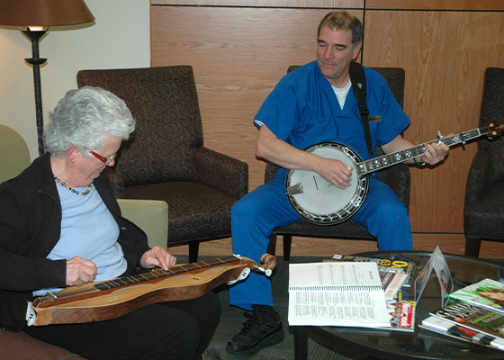 Dr. Gary playing banjo