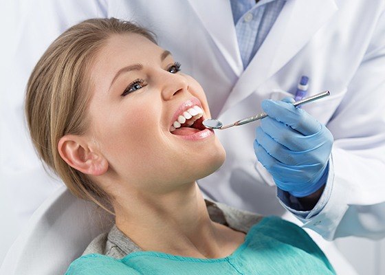 woman getting periodontal therapy