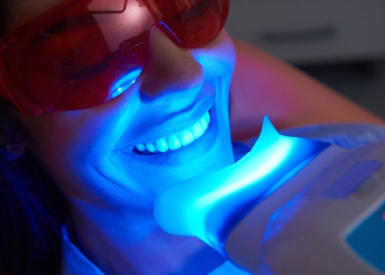 woman undergoing in-office teeth whitening