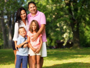 happy family posing for photo