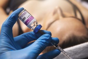 filling syringe with botox